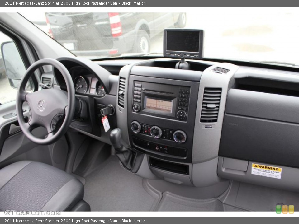 Black Interior Dashboard for the 2011 Mercedes-Benz Sprinter 2500 High Roof Passenger Van #48776049