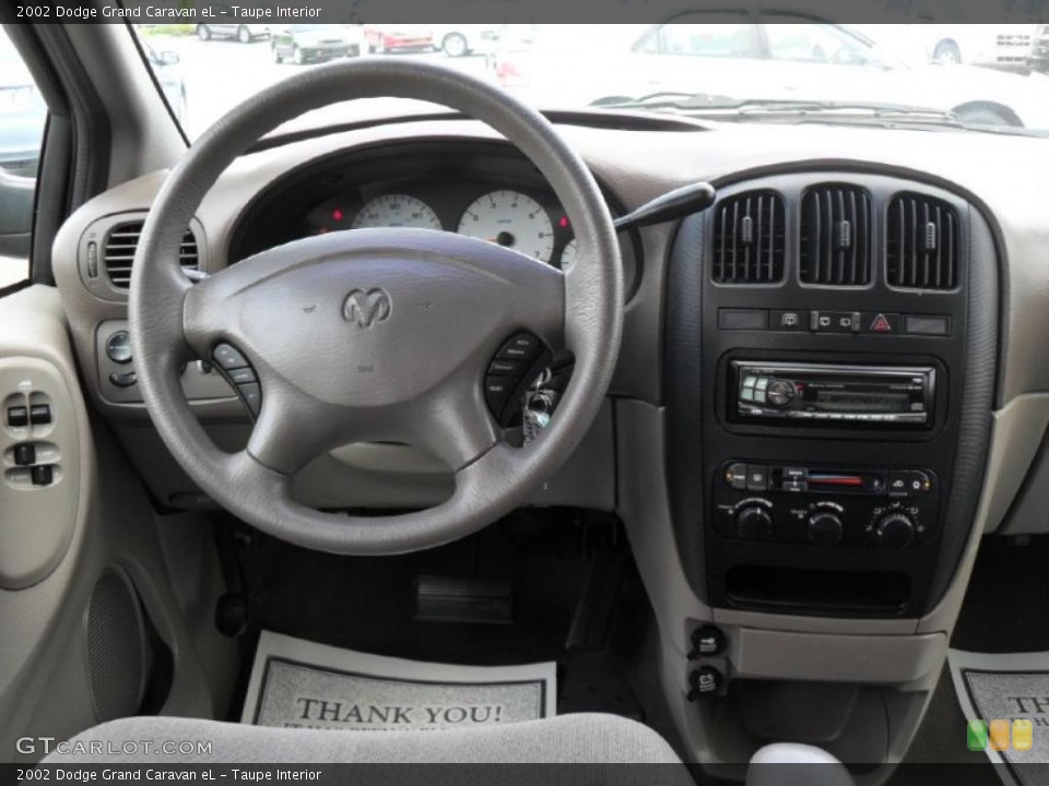 Taupe Interior Dashboard for the 2002 Dodge Grand Caravan eL #48806297
