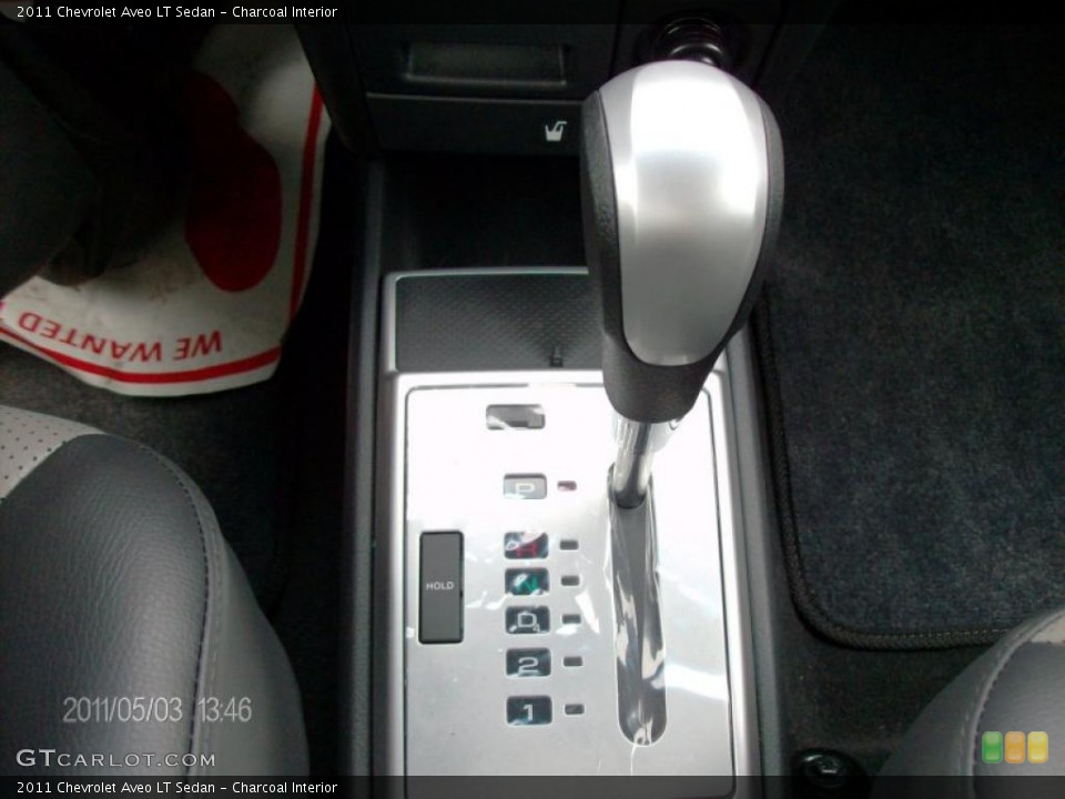 Charcoal Interior Transmission for the 2011 Chevrolet Aveo LT Sedan #48818079