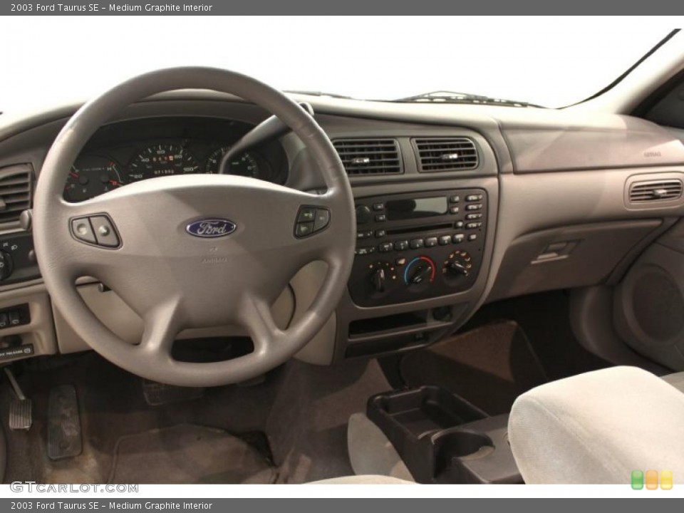 Medium Graphite Interior Dashboard for the 2003 Ford Taurus SE #48877648