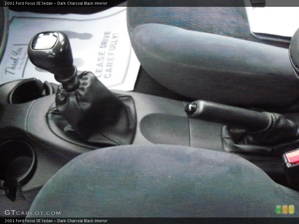 Dark Charcoal Black Interior Transmission for the 2001 Ford Focus SE Sedan #48880194
