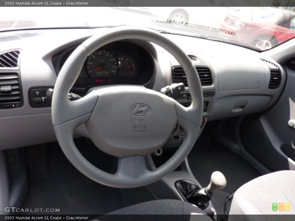 Gray Interior Dashboard for the 2003 Hyundai Accent GL Coupe #48933274