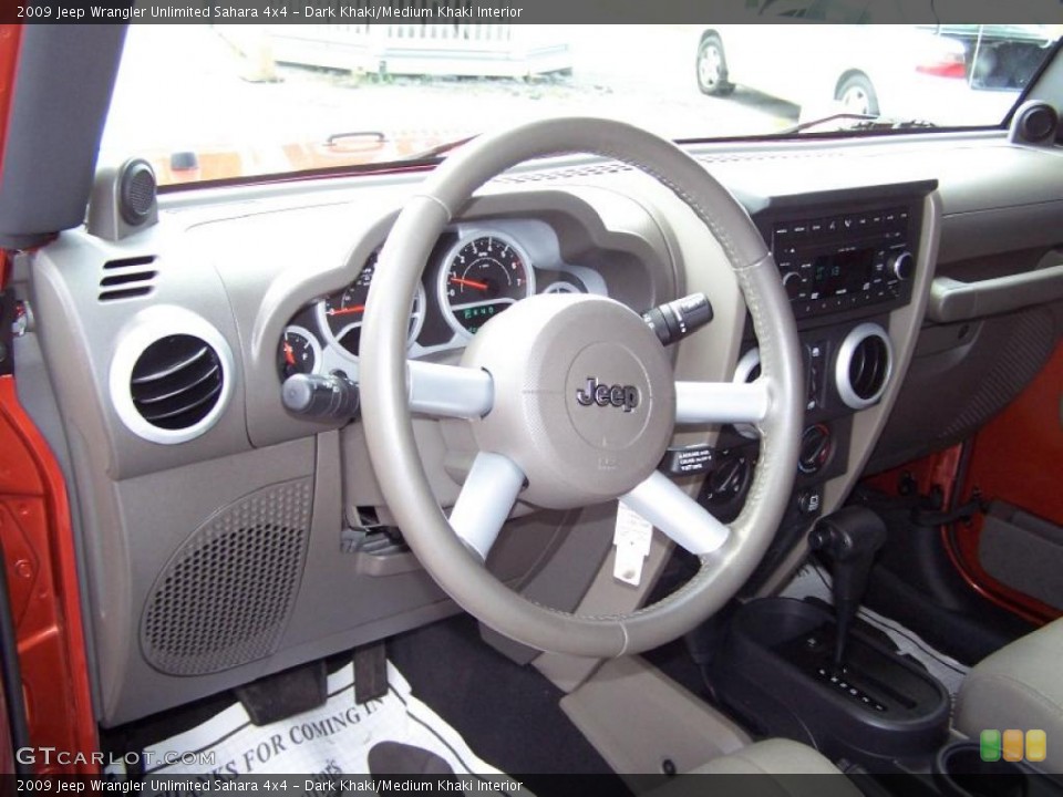 Dark Khaki/Medium Khaki Interior Dashboard for the 2009 Jeep Wrangler Unlimited Sahara 4x4 #48950950