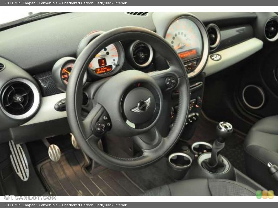 Checkered Carbon Black/Black Interior Dashboard for the 2011 Mini Cooper S Convertible #48954256