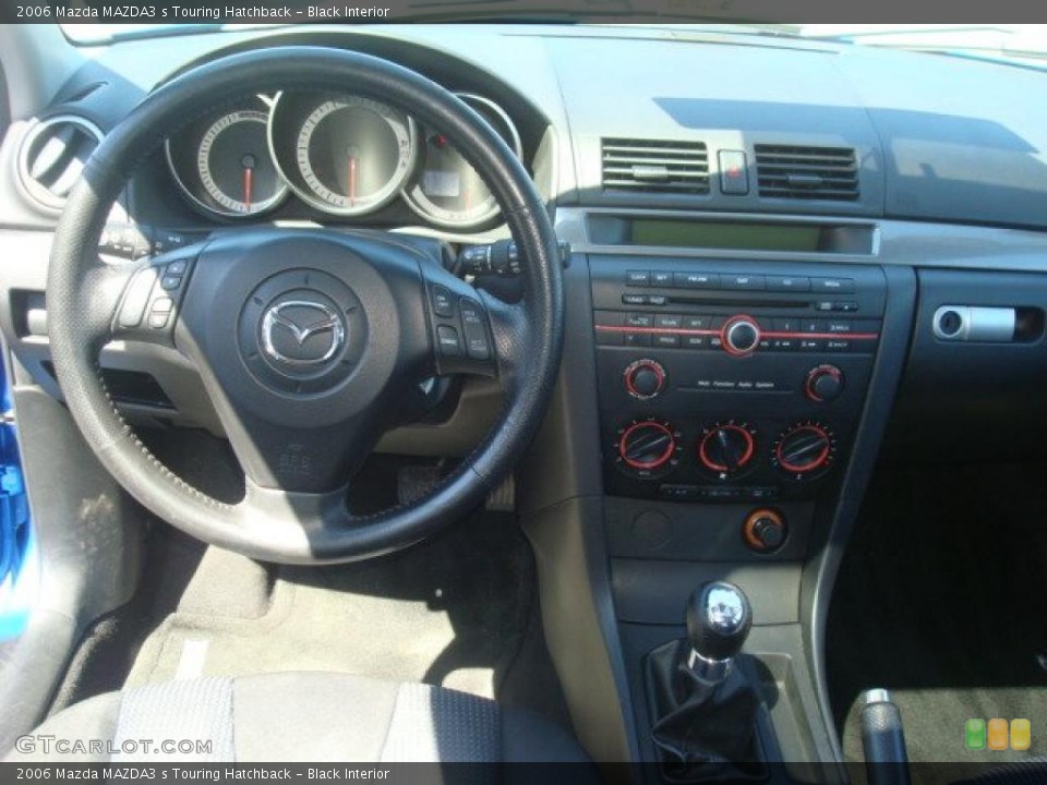 Black Interior Dashboard for the 2006 Mazda MAZDA3 s Touring Hatchback #49014263