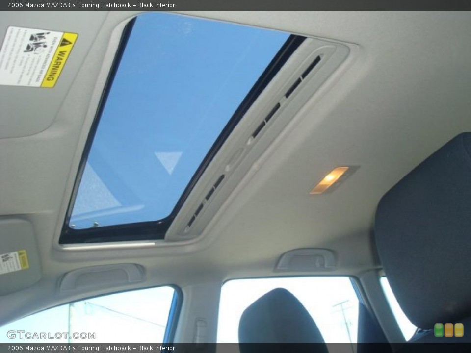 Black Interior Sunroof for the 2006 Mazda MAZDA3 s Touring Hatchback #49014279