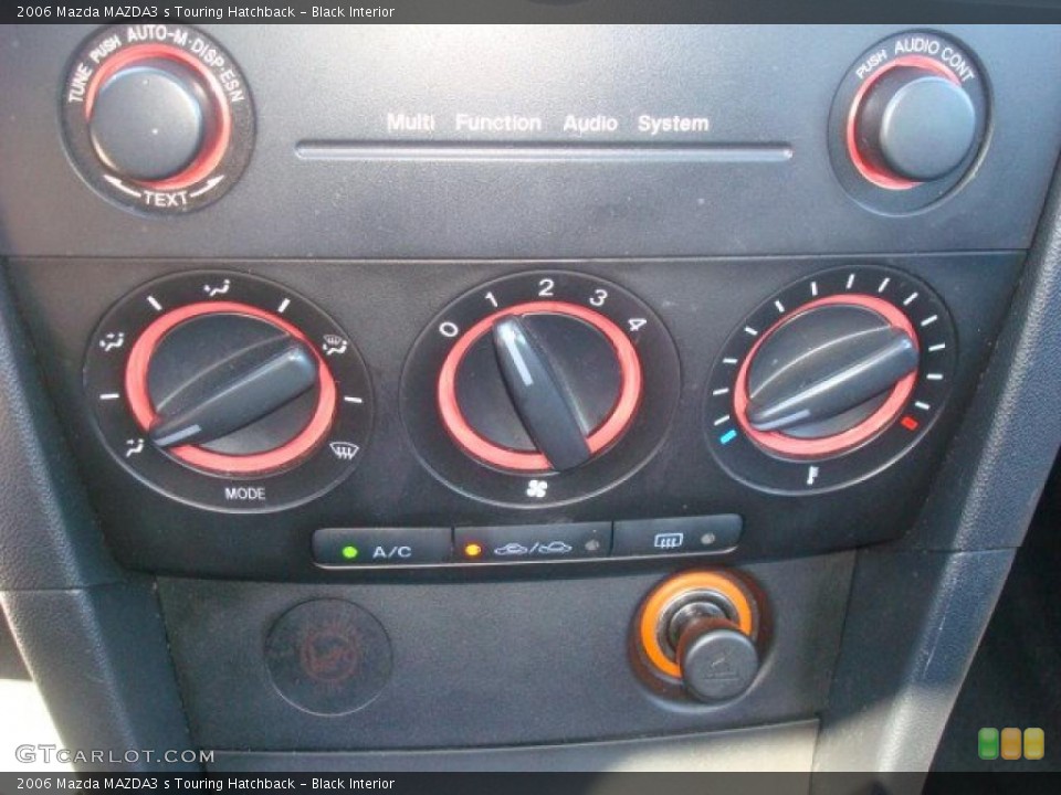 Black Interior Controls for the 2006 Mazda MAZDA3 s Touring Hatchback #49014334