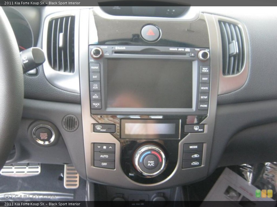 Black Sport Interior Controls for the 2011 Kia Forte Koup SX #49044462