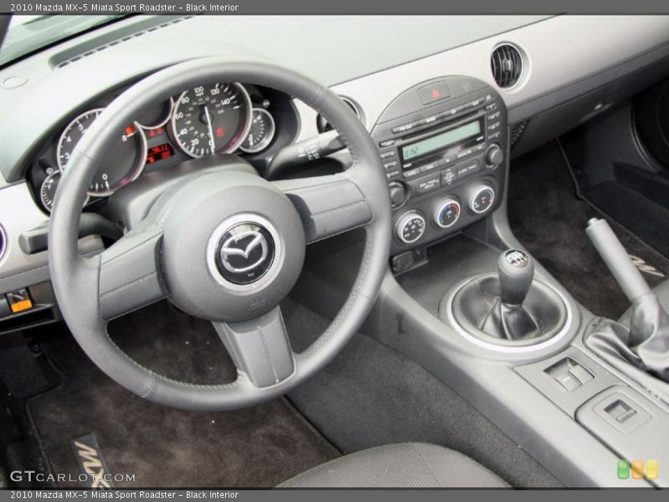 Black Interior Dashboard for the 2010 Mazda MX-5 Miata Sport Roadster #49062476