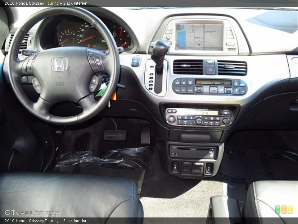 Black Interior Dashboard for the 2010 Honda Odyssey Touring #49068101