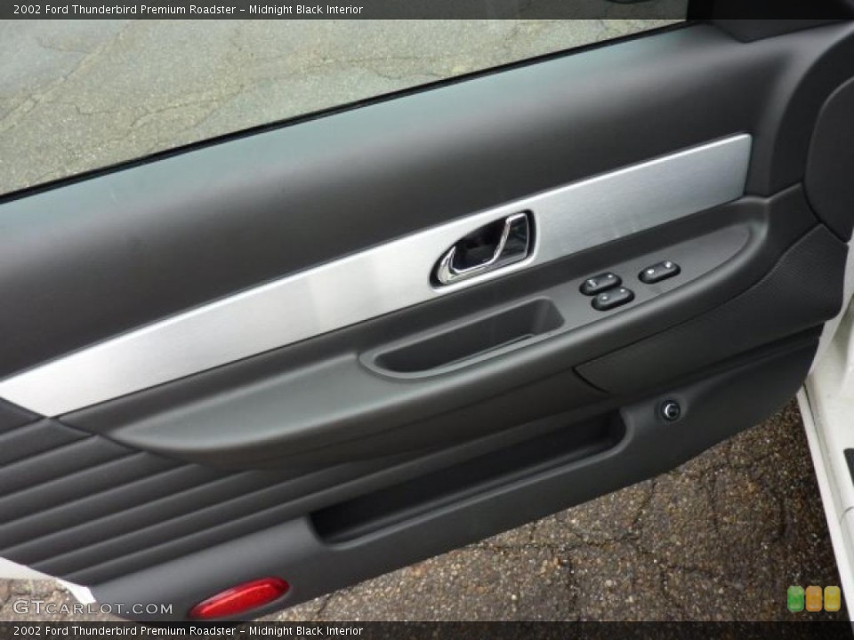 Midnight Black Interior Door Panel for the 2002 Ford Thunderbird Premium Roadster #49070999