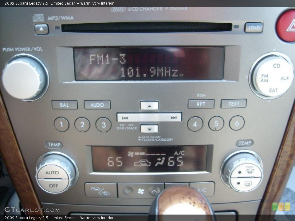 Warm Ivory Interior Controls for the 2009 Subaru Legacy 2.5i Limited Sedan #49083167
