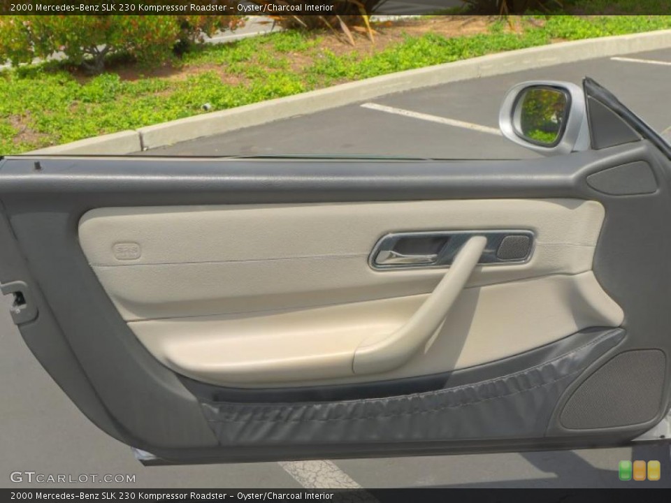 Oyster/Charcoal Interior Door Panel for the 2000 Mercedes-Benz SLK 230 Kompressor Roadster #49089621