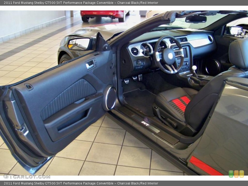 Charcoal Black/Red Interior Photo for the 2011 Ford Mustang Shelby GT500 SVT Performance Package Convertible #49104215