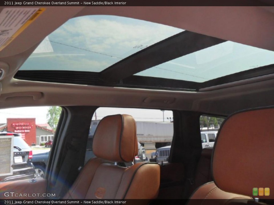 New Saddle/Black Interior Sunroof for the 2011 Jeep Grand Cherokee Overland Summit #49120124