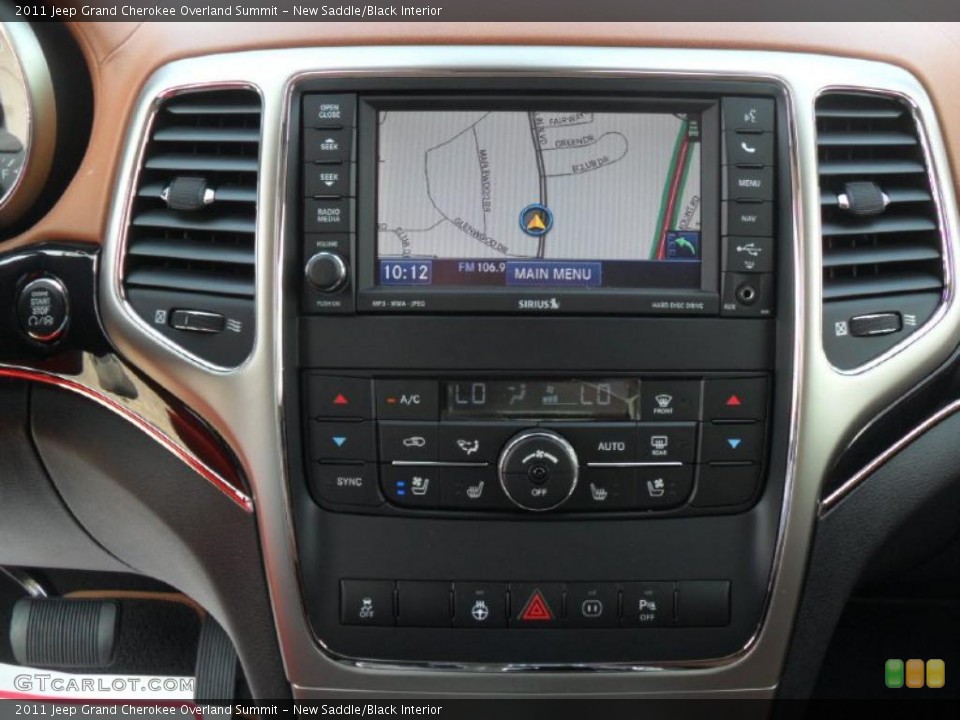 New Saddle/Black Interior Controls for the 2011 Jeep Grand Cherokee Overland Summit #49120156