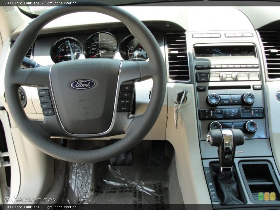 Light Stone Interior Dashboard for the 2011 Ford Taurus SE #49122479