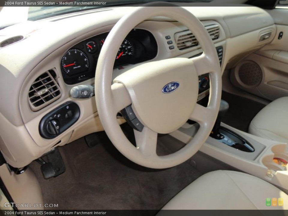 Medium Parchment Interior Steering Wheel for the 2004 Ford Taurus SES Sedan #49123941