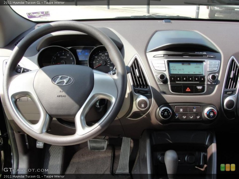 Taupe Interior Dashboard for the 2011 Hyundai Tucson GL #49125284