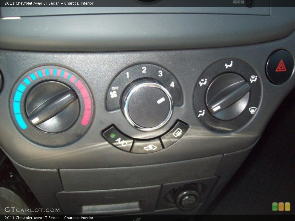 Charcoal Interior Controls for the 2011 Chevrolet Aveo LT Sedan #49128485