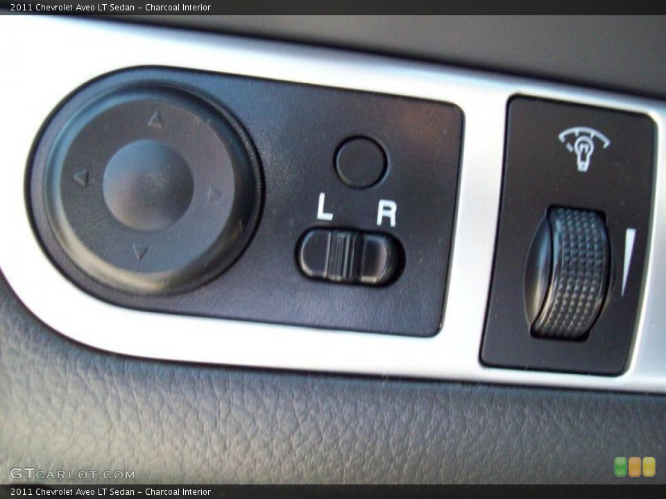 Charcoal Interior Controls for the 2011 Chevrolet Aveo LT Sedan #49128518