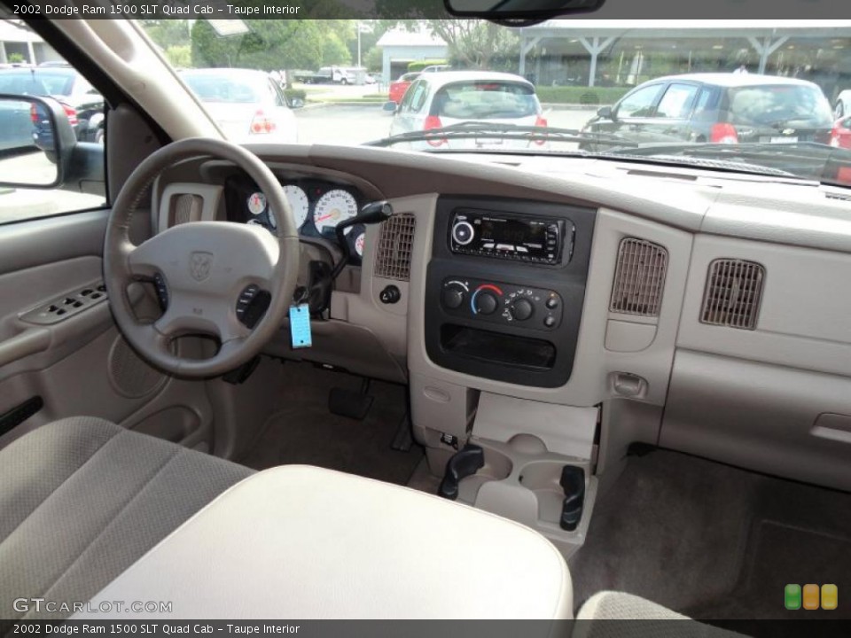 Taupe Interior Dashboard for the 2002 Dodge Ram 1500 SLT Quad Cab #49128548
