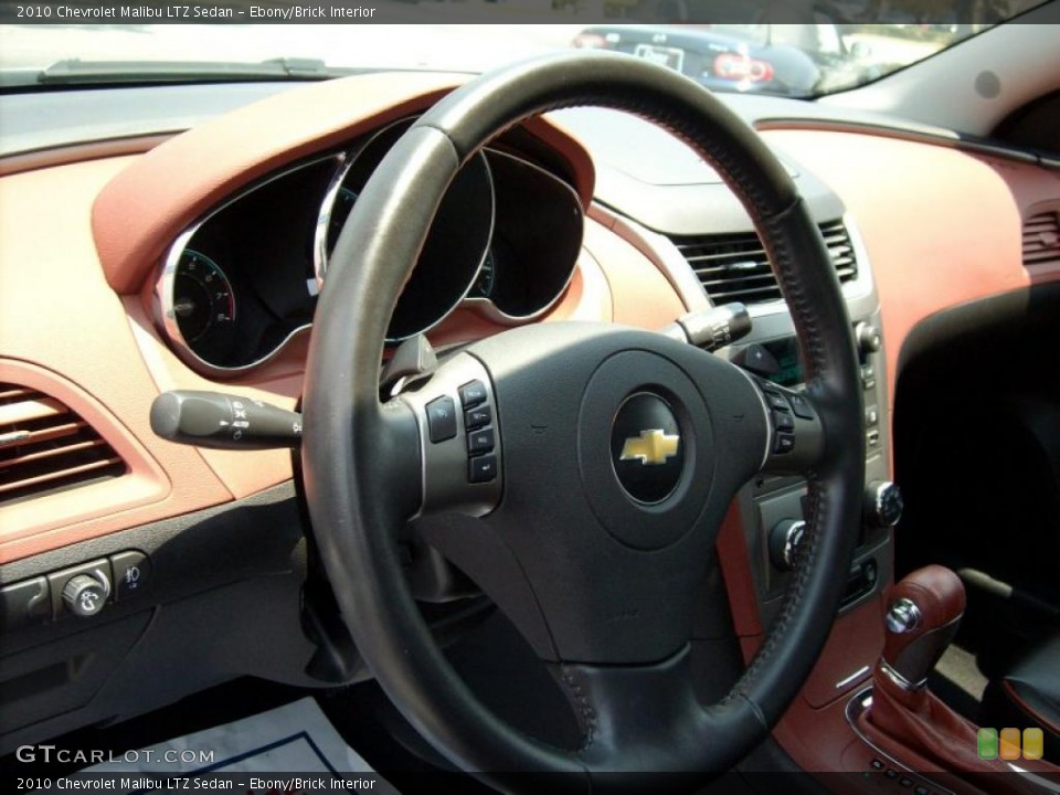 Ebony/Brick Interior Steering Wheel for the 2010 Chevrolet Malibu LTZ Sedan #49137854