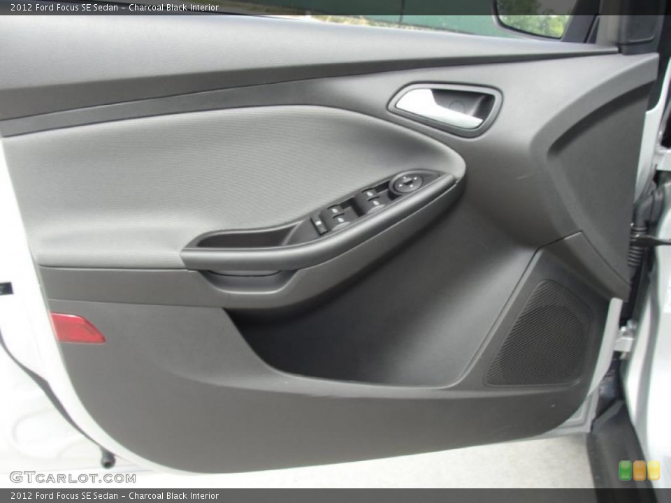 Charcoal Black Interior Door Panel for the 2012 Ford Focus SE Sedan #49147331