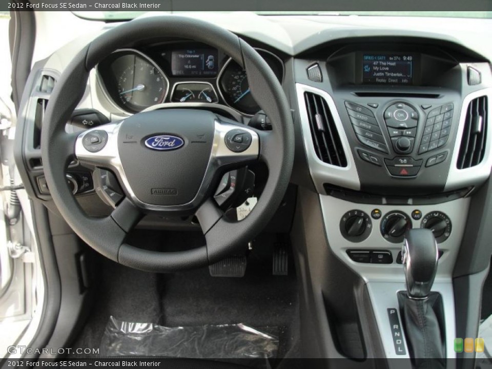 Charcoal Black Interior Dashboard for the 2012 Ford Focus SE Sedan #49147391