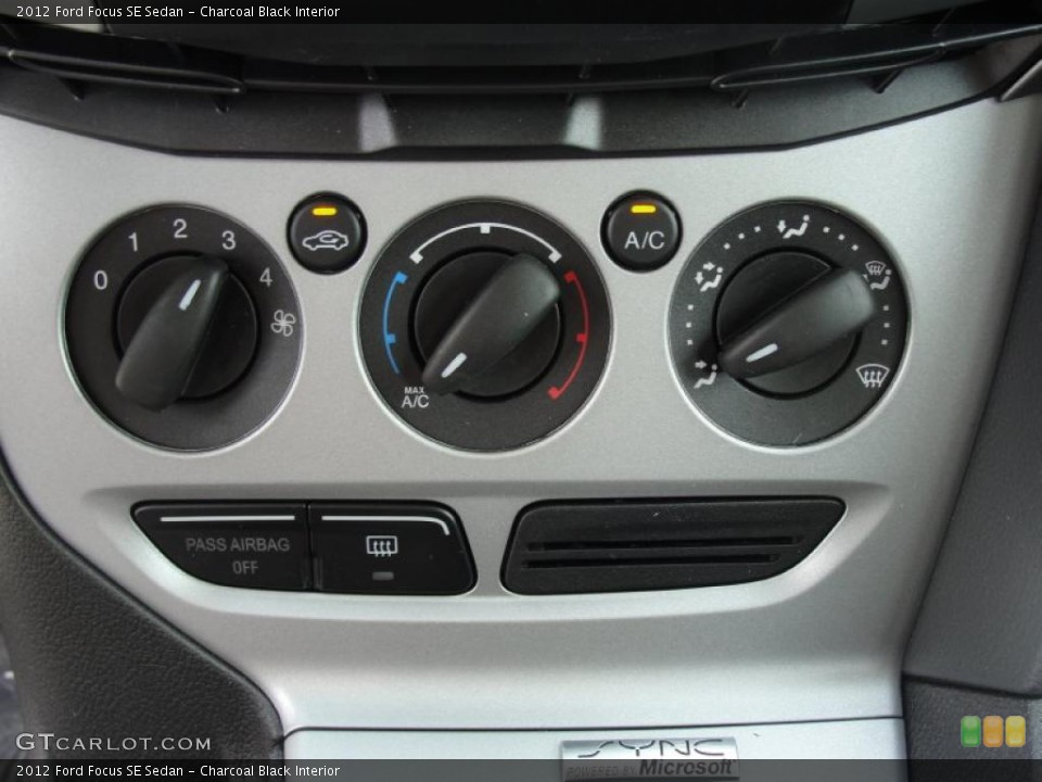 Charcoal Black Interior Controls for the 2012 Ford Focus SE Sedan #49147448