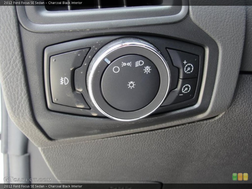 Charcoal Black Interior Controls for the 2012 Ford Focus SE Sedan #49147505