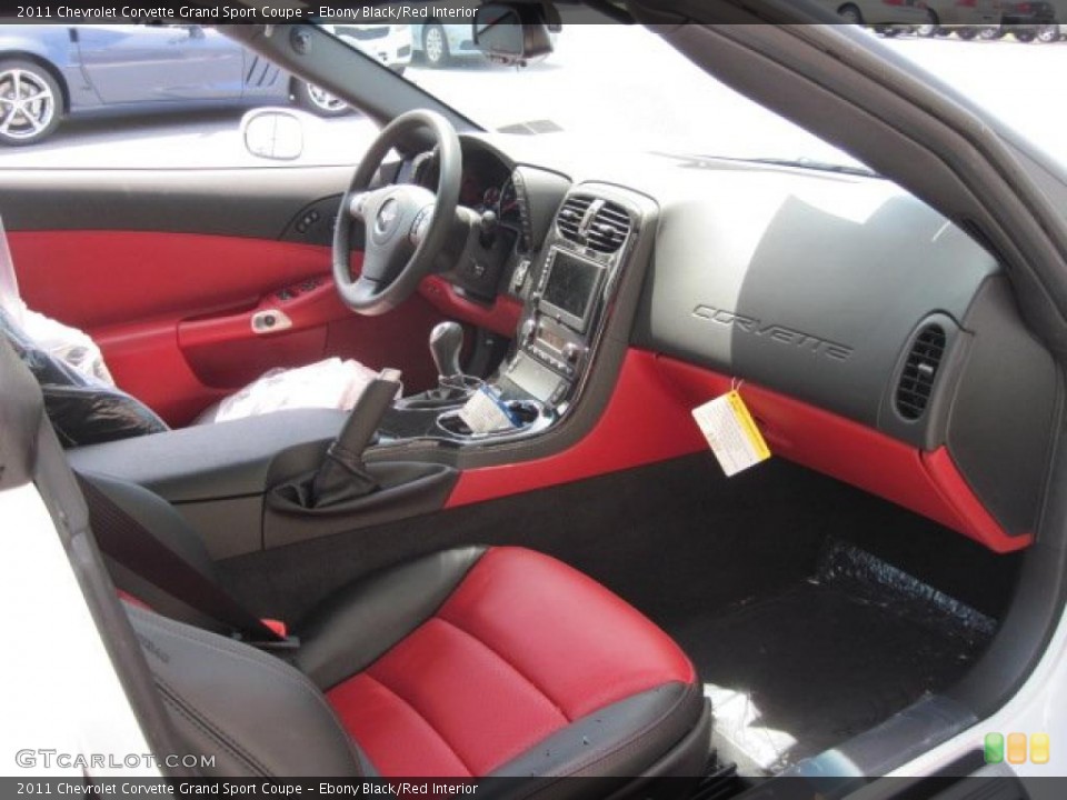 Ebony Black/Red Interior Photo for the 2011 Chevrolet Corvette Grand Sport Coupe #49165586