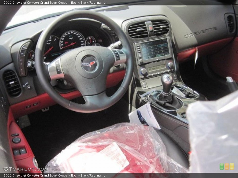 Ebony Black/Red Interior Dashboard for the 2011 Chevrolet Corvette Grand Sport Coupe #49165661
