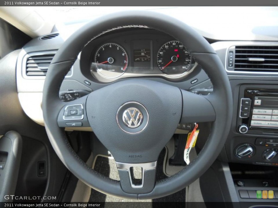 Cornsilk Beige Interior Steering Wheel for the 2011 Volkswagen Jetta SE Sedan #49177280