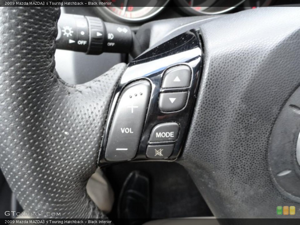 Black Interior Controls for the 2009 Mazda MAZDA3 s Touring Hatchback #49196960