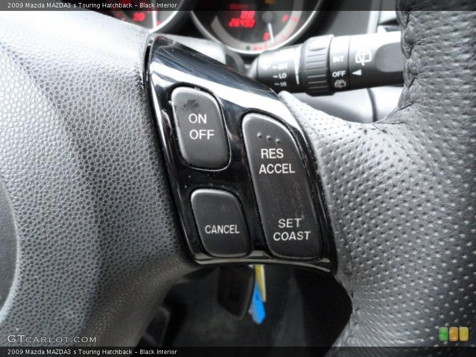 Black Interior Controls for the 2009 Mazda MAZDA3 s Touring Hatchback #49196975