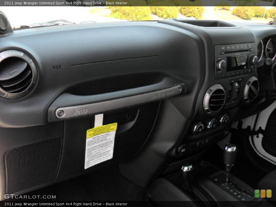 Black Interior Photo for the 2011 Jeep Wrangler Unlimited Sport 4x4 Right Hand Drive #49209113