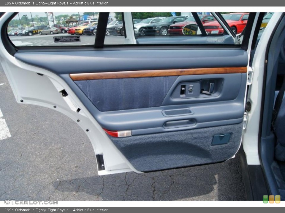 Adriatic Blue Interior Door Panel for the 1994 Oldsmobile Eighty-Eight Royale #49215056