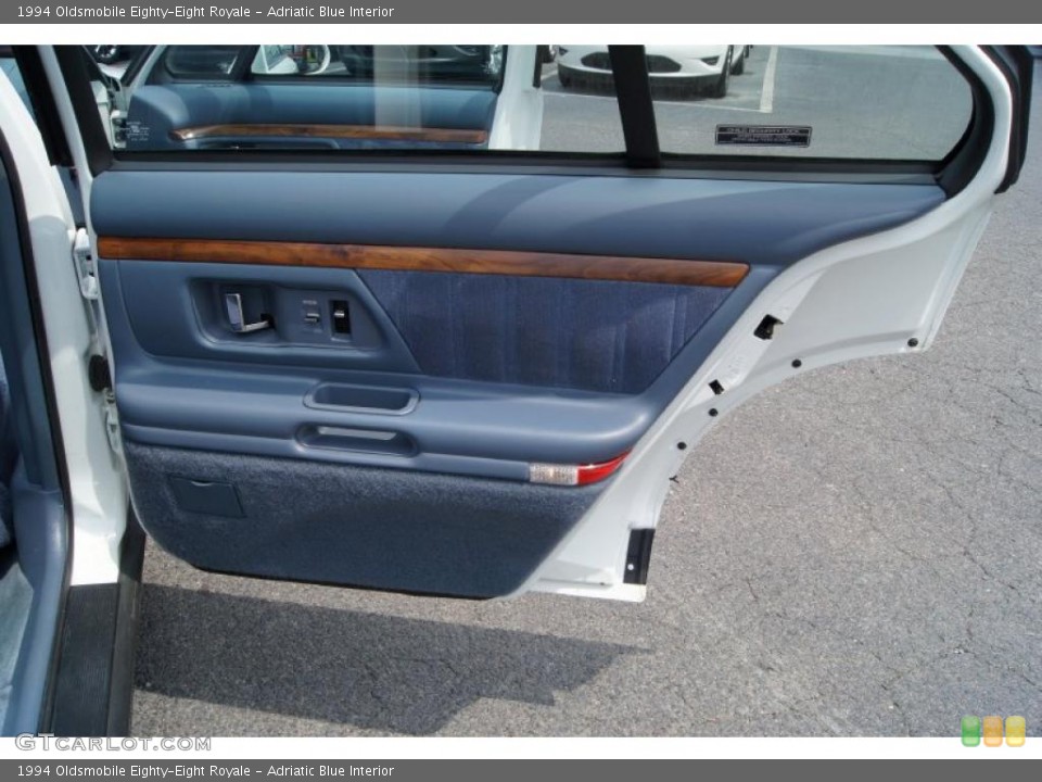 Adriatic Blue Interior Door Panel for the 1994 Oldsmobile Eighty-Eight Royale #49215101