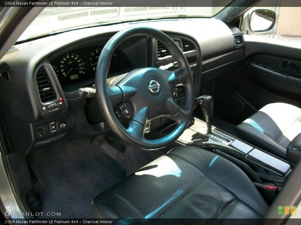 Charcoal Interior Dashboard for the 2004 Nissan Pathfinder LE Platinum 4x4 #49229339