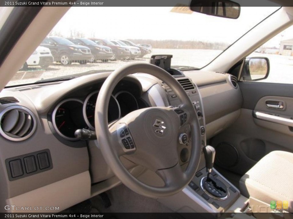Beige Interior Steering Wheel for the 2011 Suzuki Grand Vitara Premium 4x4 #49247942