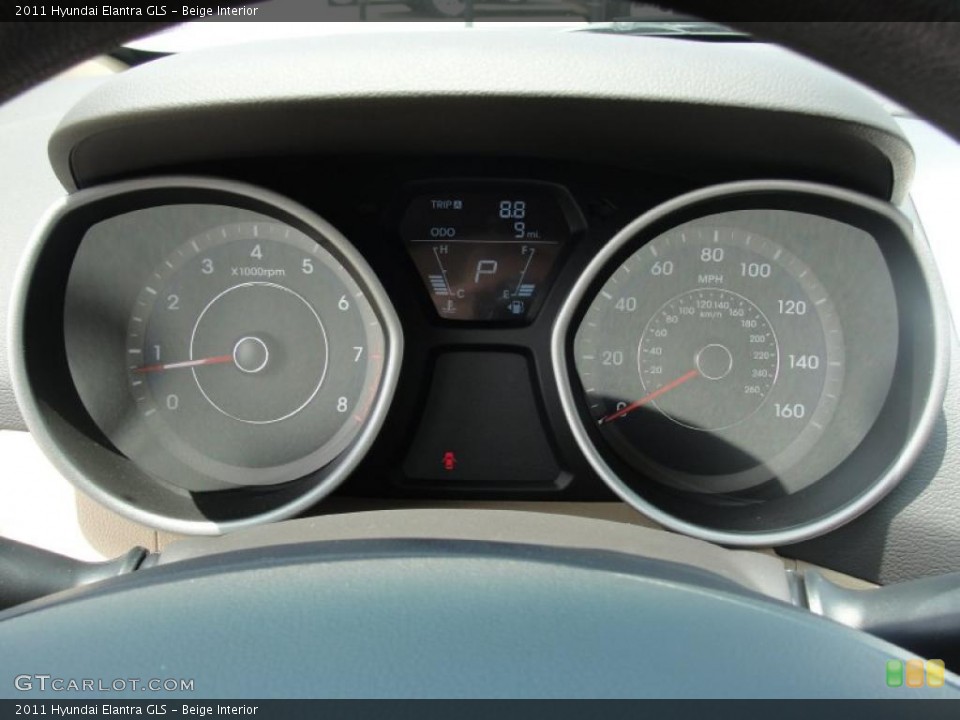Beige Interior Gauges for the 2011 Hyundai Elantra GLS #49256318