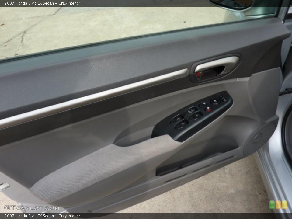 Gray Interior Door Panel for the 2007 Honda Civic EX Sedan #49308078