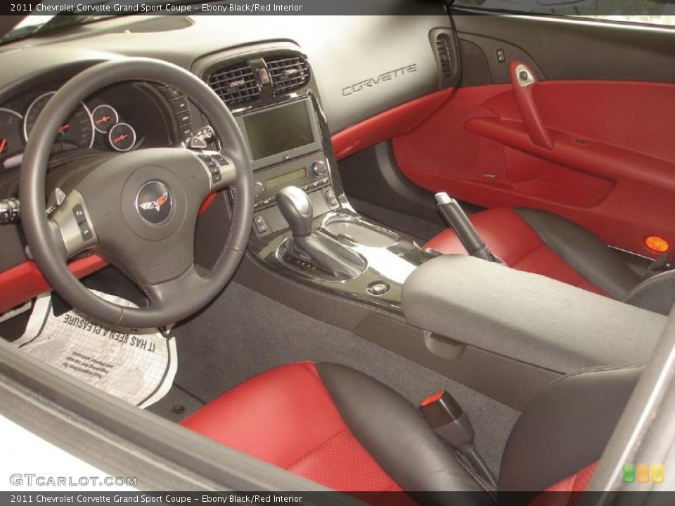 Ebony Black/Red Interior Photo for the 2011 Chevrolet Corvette Grand Sport Coupe #49315248