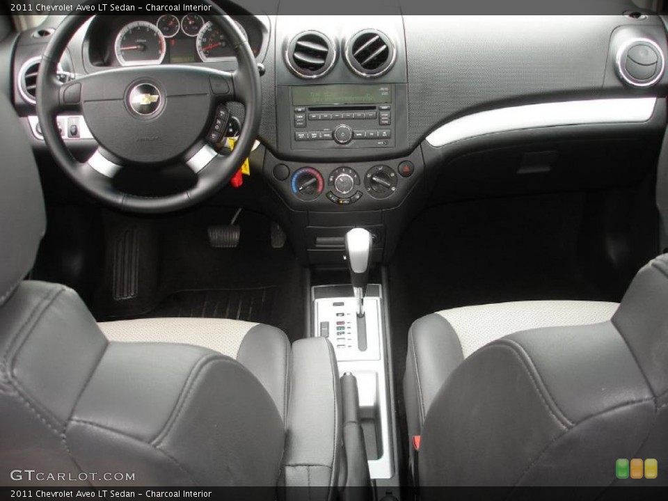 Charcoal Interior Dashboard for the 2011 Chevrolet Aveo LT Sedan #49317963