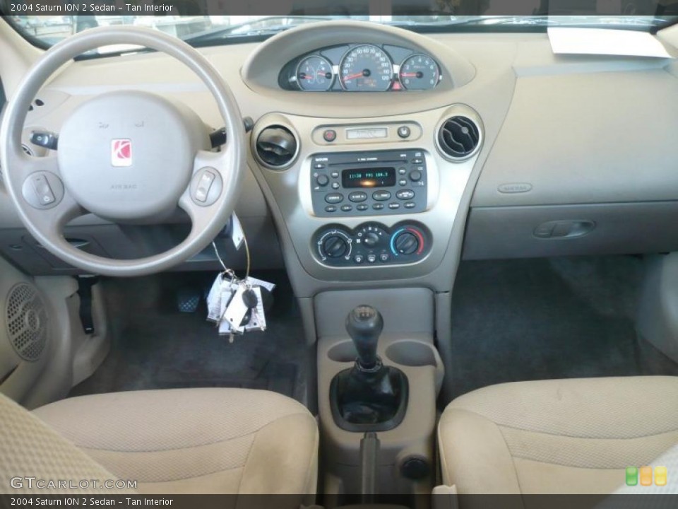 Tan Interior Dashboard for the 2004 Saturn ION 2 Sedan #49323192