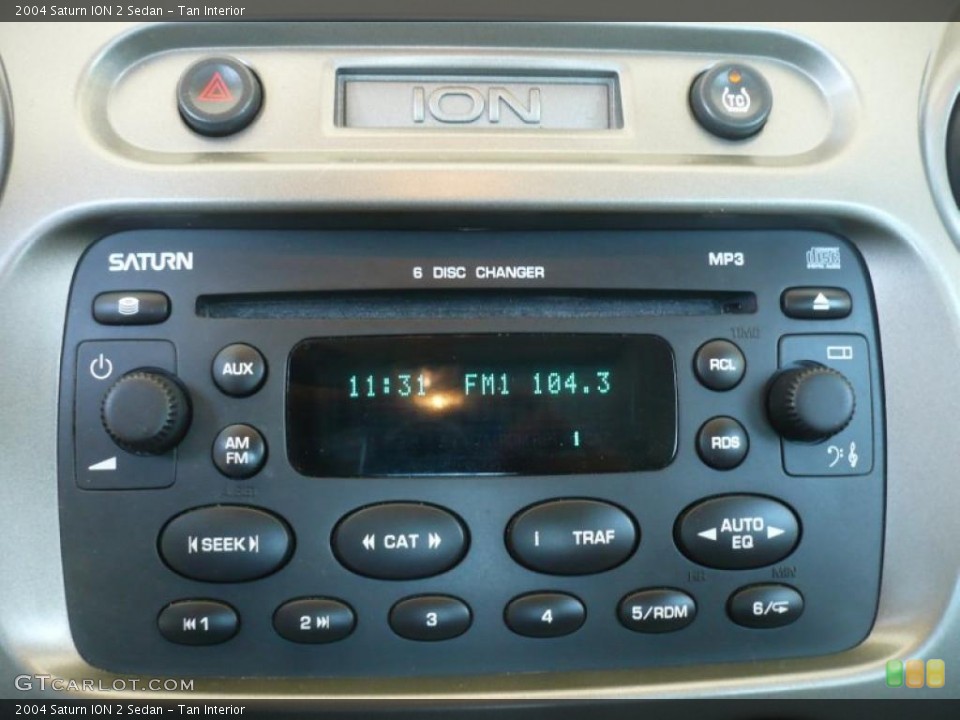 Tan Interior Controls for the 2004 Saturn ION 2 Sedan #49323288
