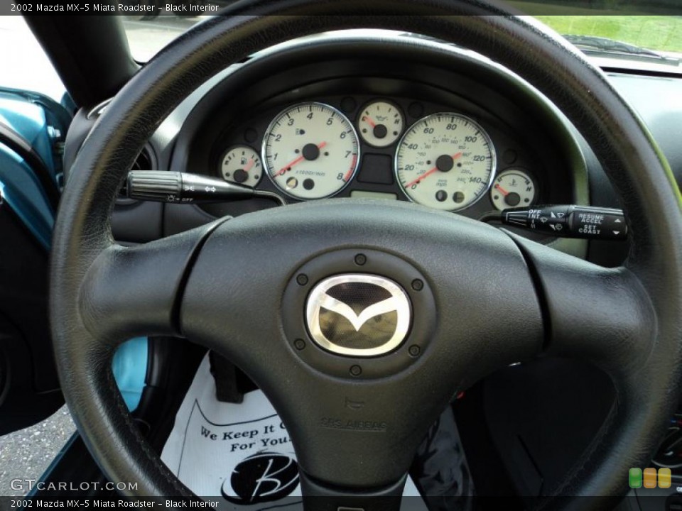 Black Interior Steering Wheel for the 2002 Mazda MX-5 Miata Roadster #49360414