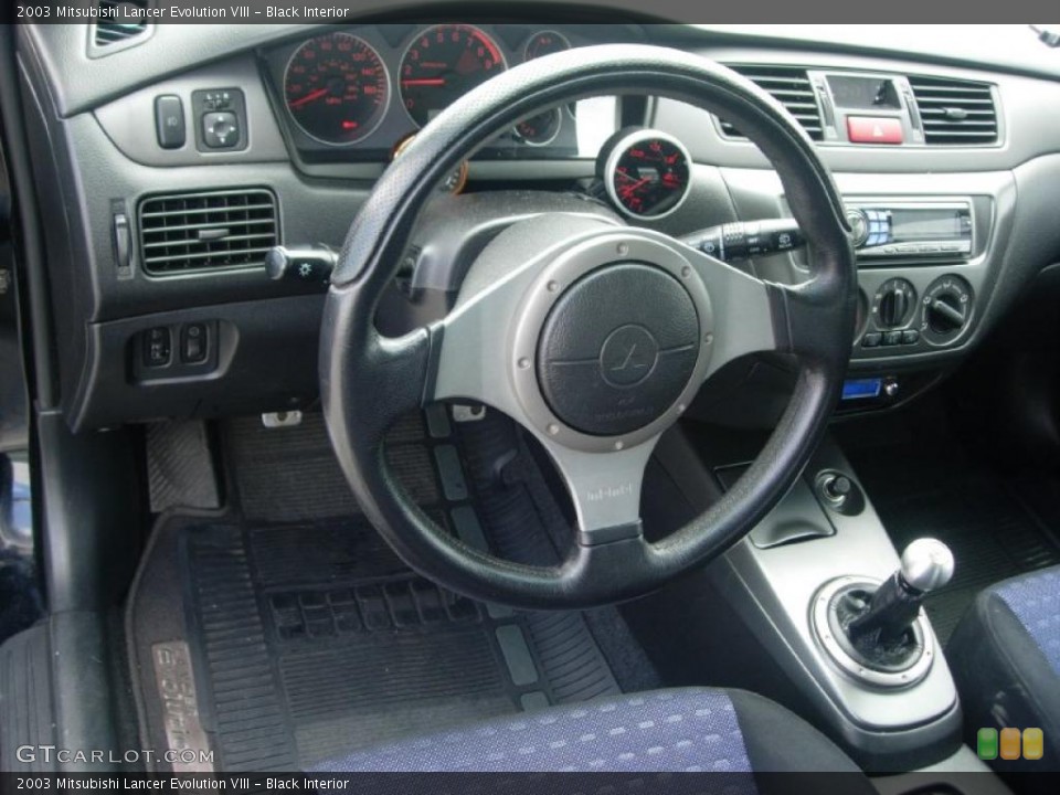 Black Interior Dashboard for the 2003 Mitsubishi Lancer Evolution VIII #49363814