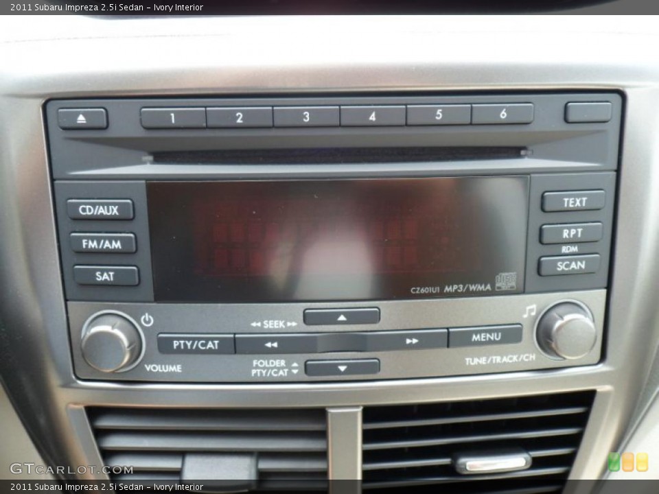 Ivory Interior Controls for the 2011 Subaru Impreza 2.5i Sedan #49365854